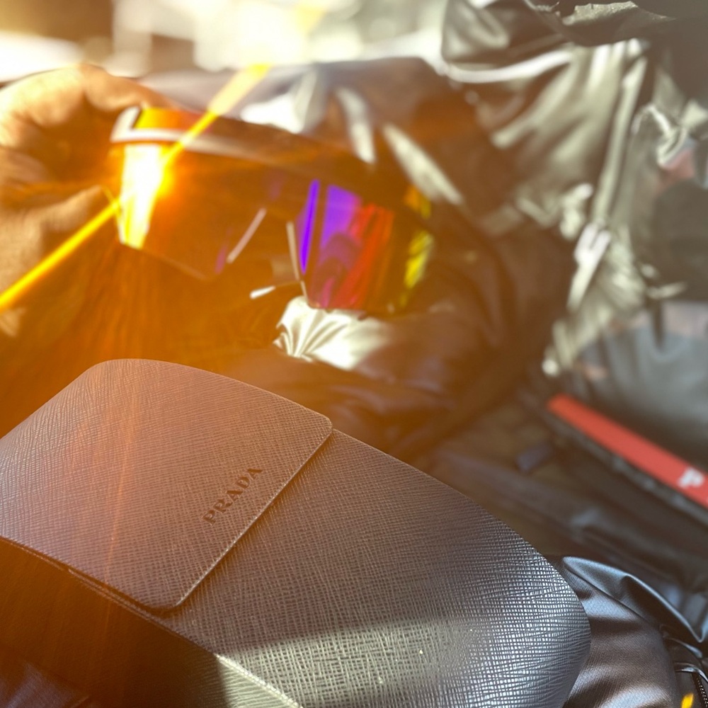 Prada Black Frame Sunglasses with Multicolor Lenses